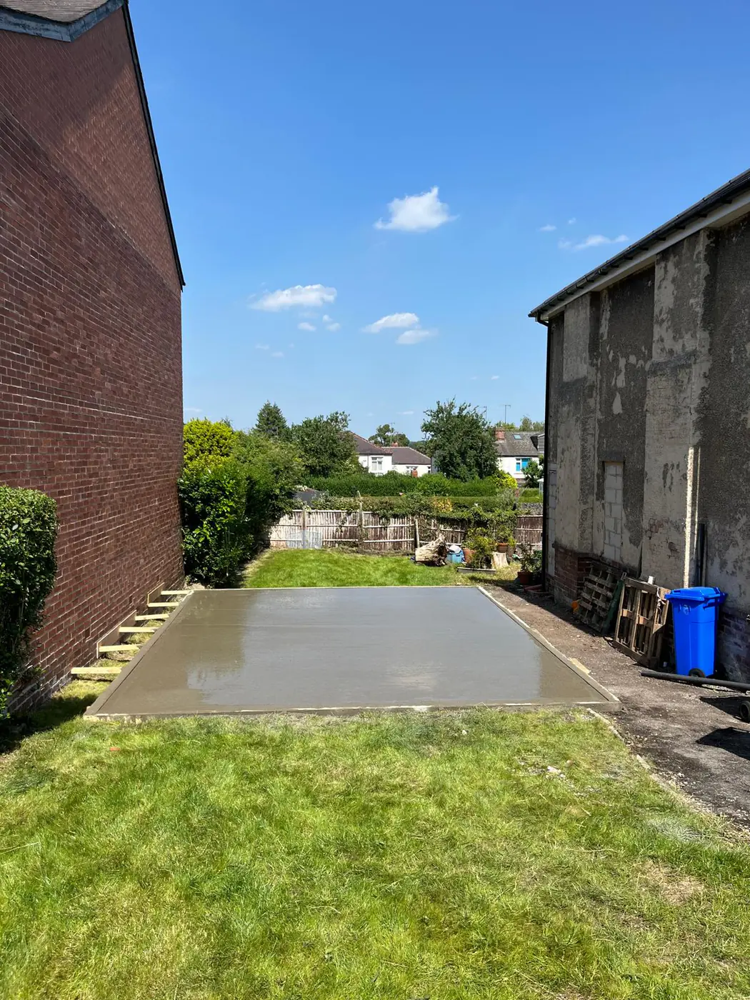 Freshly poured side-return base between properties