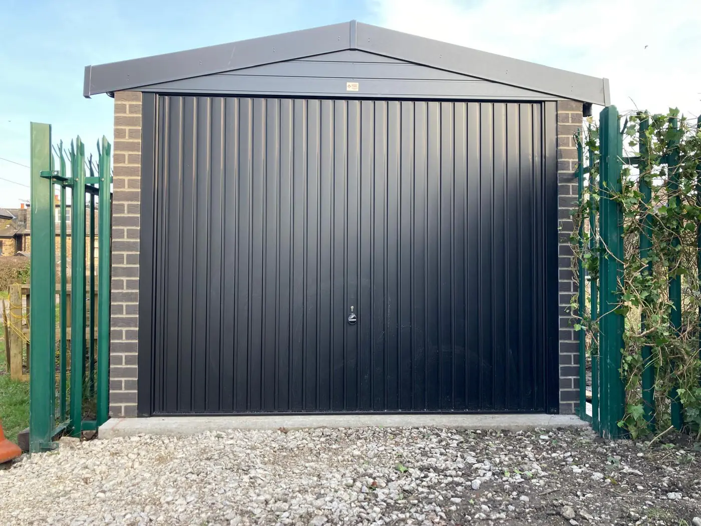 Completed garage with anthracite up-and-over door