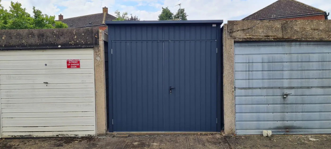Completed garage with anthracite double doors