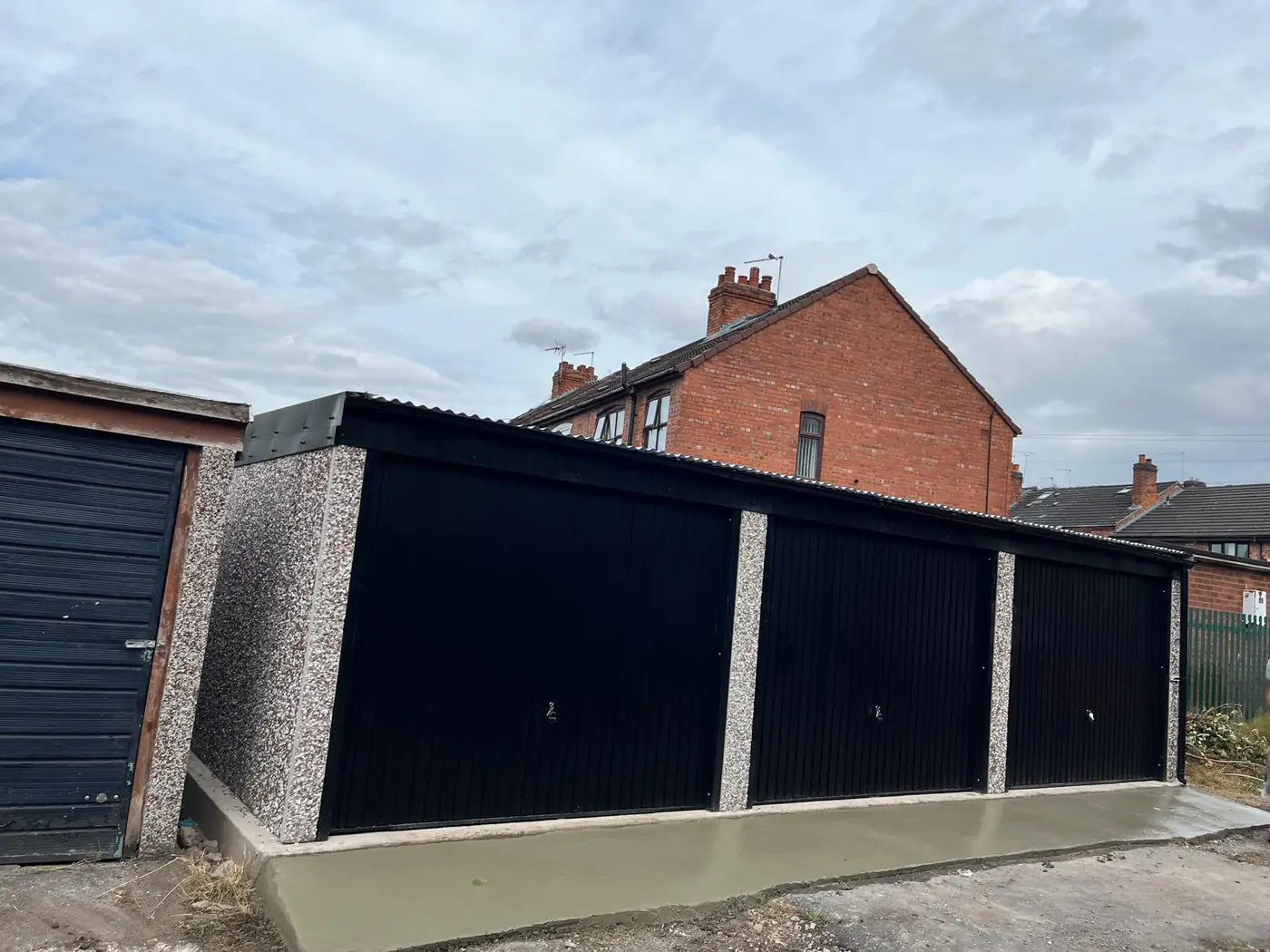 Completed block of three garages