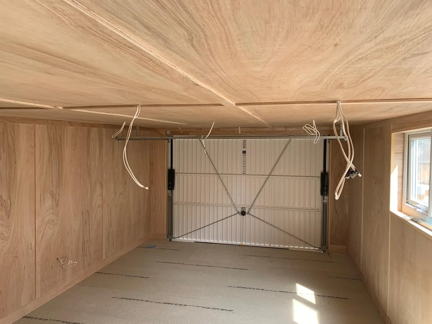 Ply lining and up-and-over door fitted