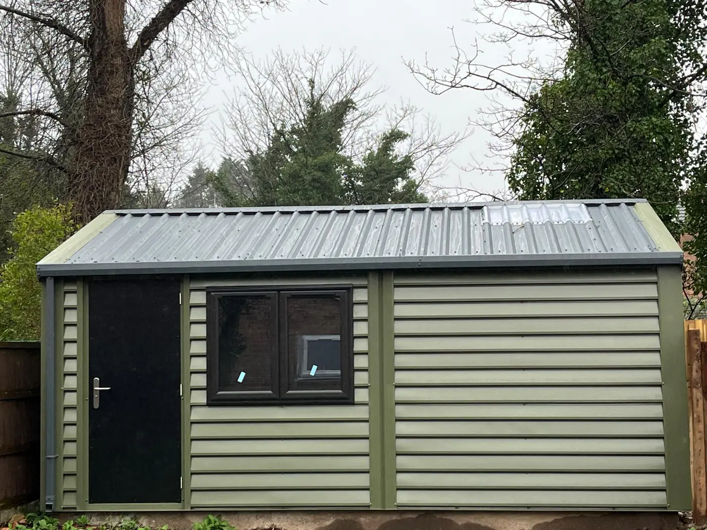 Completed garden room in sage cladding